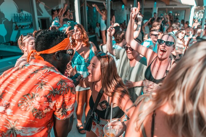 4 Hour Day Party at Beach Clubs in Mykonos - Stop 1: Super Paradise Beach and JackieO’—two scenes on the same shoreline