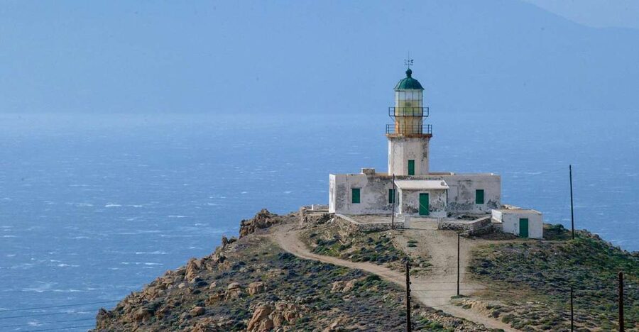 Armenistis Lighthouse Visit - The view logic: why Tinos feels close and boats become part of the show