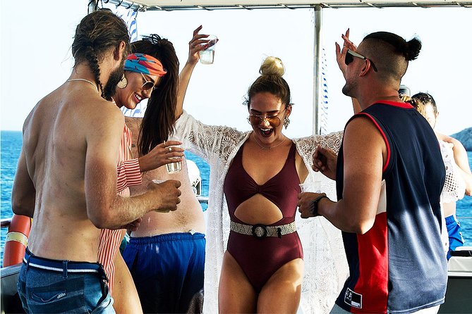 Boat Party with Swimming Stop Experience in Mykonos - The First Half: Sunset Cruise, Drinks, and a Swim Stop Near Rhenia