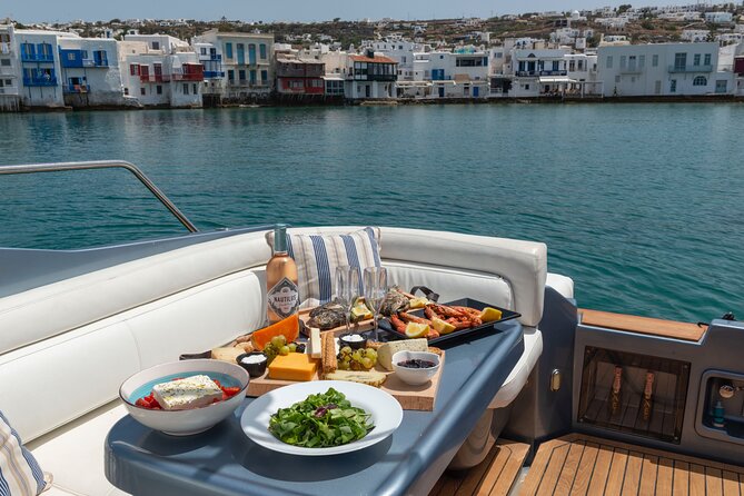 Boat - yacht tours at Mykonos - What’s Included Onboard: Drinks, Snacks, Towels, Wi‑Fi, and Music