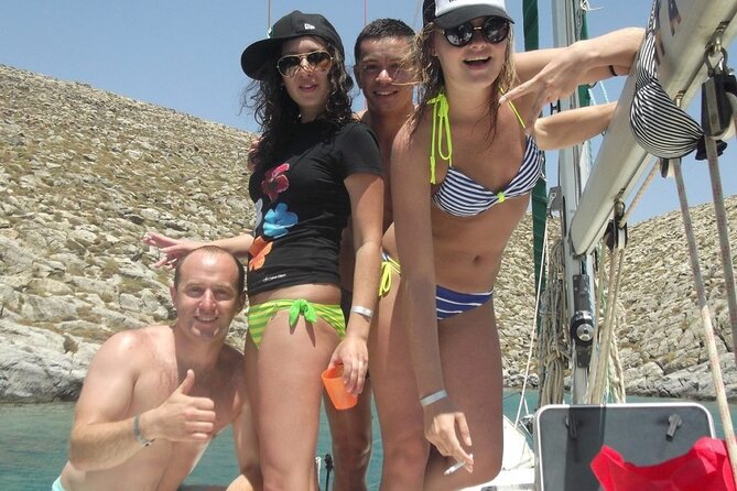 Catamaran cruise in Mykonos with Meal, Drinks & Transport - Sailing past the islands: Baos to Delos