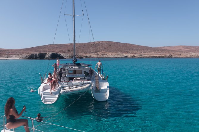 Catamaran Day & Sunset Cruises with meals Drinks and transportation - Delos from the water: photos, narration, and no land stop hassle