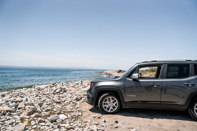 Explore Mykonos with local guide and Jeep Renegade Private Tour - Stop 1: Armenistis Lighthouse for big Aegean photos
