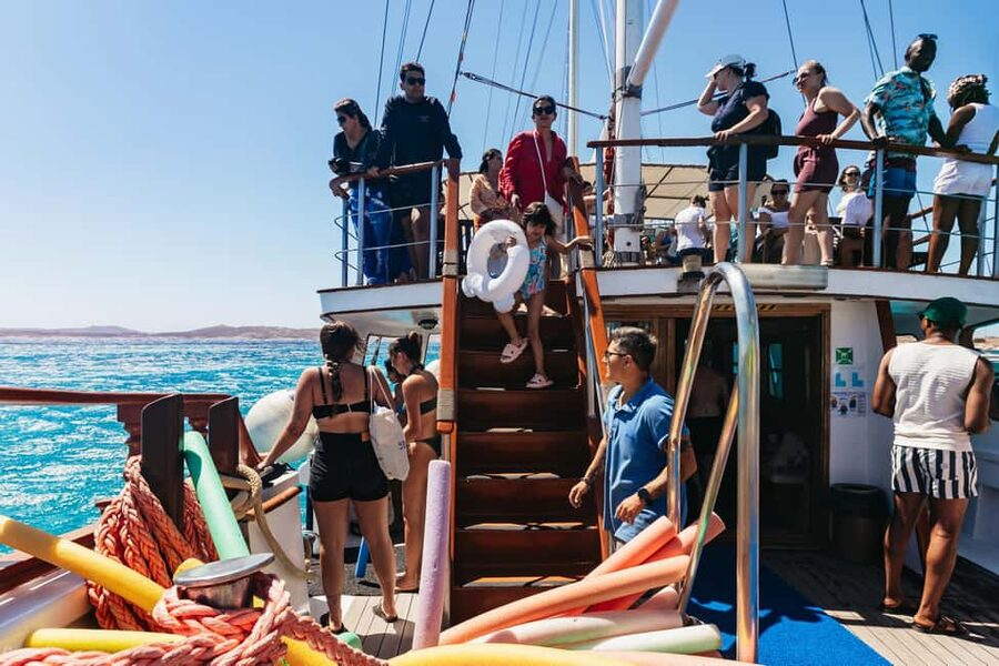 From Mykonos: Cruise to Delos and Rhenia with Lunch - On Board: Drinks, Music, and a Smooth-Rolling Day