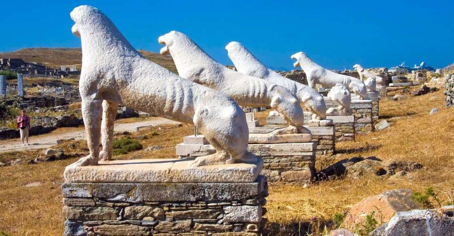 From Mykonos: Delos Archaeological Site Guided Evening Tour - Arriving at Delos: Where the Guide Sets the Scene