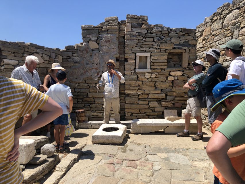 From Naxos: Delos and Mykonos Day Trip with Licensed Guide - The theatre viewpoint: finishing Delos from the hill