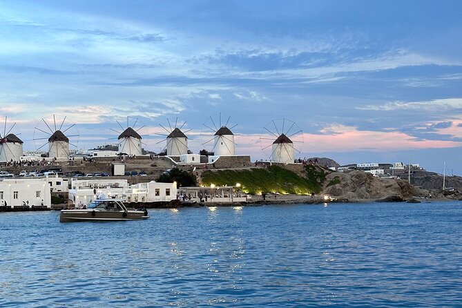 Half-Day Private Cruise with Kaiki around Mykonos - Setting sail near Psarou and the Nammos effect