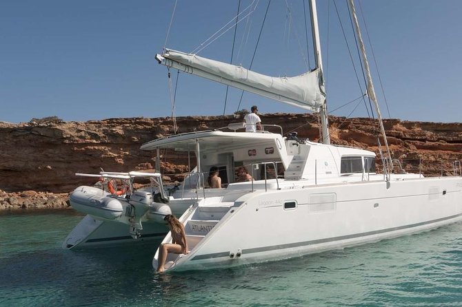 Luxury Catamaran Semi private cruise with meals & drinks and transportation. - Morning or Sunset Sails in Mykonos: Picking the right mood