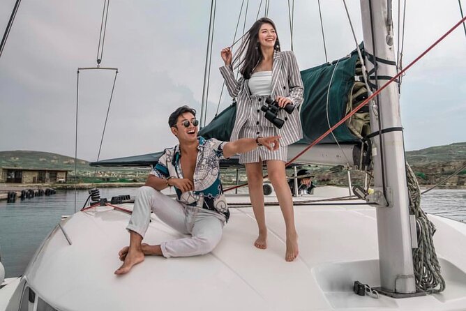 Luxury Catamaran Semi private cruise with meals & drinks and transportation. - Rhenia swim stop: crystal water, provided gear, and real time to relax
