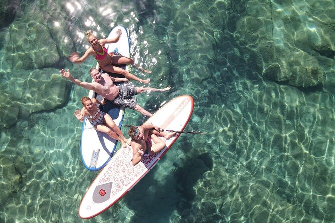 Morning and Sunset Cruise with Meal and Transport Included - Rhenia swim and snorkeling: the best part of the day