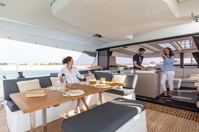 Mykonos: Brand-New Catamaran Cruise with Meal, Drinks & Transport - Stop 1: Rineia/Rhenia swim time and why the water toys matter