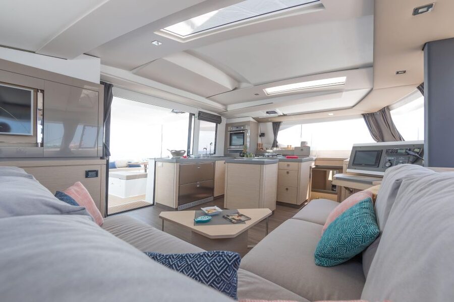 Mykonos: Catamaran Cruise with 3-Course Meal and Transfers - The swimming stop: snorkeling gear, kayak, and stand-up paddle board (when conditions allow)