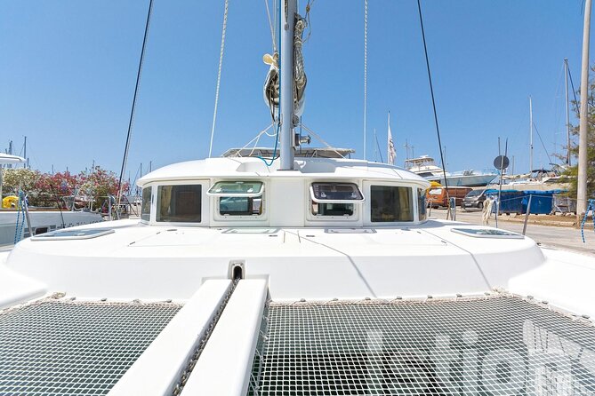 Mykonos Catamaran Cruise with Meal Drinks and Sup - Getting There: Minivan Pickup, New Port Departure, and a Smooth Start