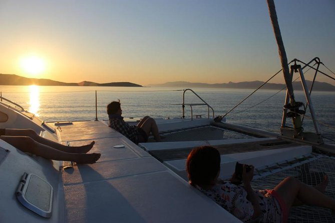 Mykonos Catamaran Private Sunset Cruise, Full Meal & Open-Bar - From Ornos Bay dock to smooth sailing in minutes