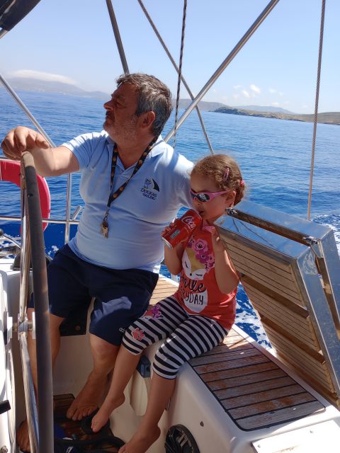 Mykonos: Delos and Rhenia Cruise with Swim and Greek Meal - Lunch onboard: Greek and Mediterranean flavors with wine, beer, and soft drinks