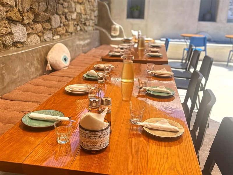 Mykonos: Group Cooking Class at the Home of a Local Family - Where you cook: the outdoor kitchen and garden setting at a village home