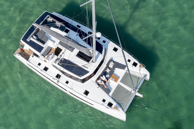 Mykonos: Luxury Catamaran Cruise with Meal, Drinks & Transport - Why a luxury catamaran day beats a beach-only plan in Mykonos