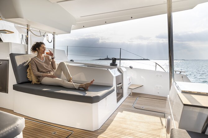 Mykonos: Luxury Catamaran Cruise with Meal, Drinks & Transport - Delos pass-by or Mykonos South Coast: the UNESCO moment without the crowds
