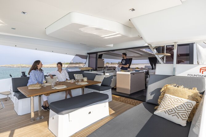 Mykonos: Luxury Catamaran Cruise with Meal, Drinks & Transport - The catamaran experience: smooth cruising and space you can actually use