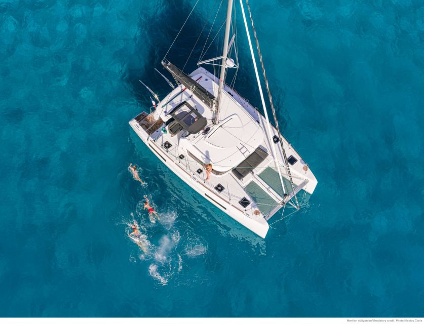 Mykonos: Private Catamaran Cruise w/ Food, Drinks & Transfer - A Private Catamaran Day Between Mykonos and Rhenia