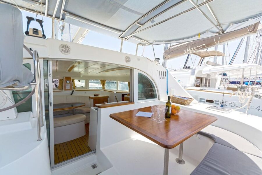 Mykonos: Private Catamaran Cruise w/ Food, Drinks & Transfer - Rhenia Island Anchor Time: Swim, Snorkel, Then Eat