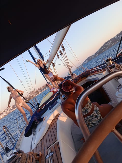 Mykonos: Rhenia Island Sunset Cruise with Transfer and Meal - Crew quality: the names you keep hearing for a reason