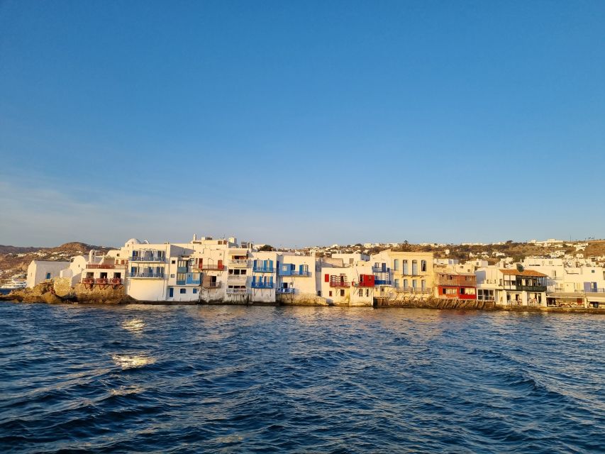 Mykonos: Semi-Prive Aegean Sunset Cruise with Mykonian Snack - Rhenia Island: the hour for photos, swimming, and local snacks