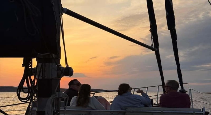 Mykonos: Sunset Boat Cruise with Light Dinner & Drinks - Boarding at Agios Ioannis Diakoftis: The Barefoot Rule and What to Bring