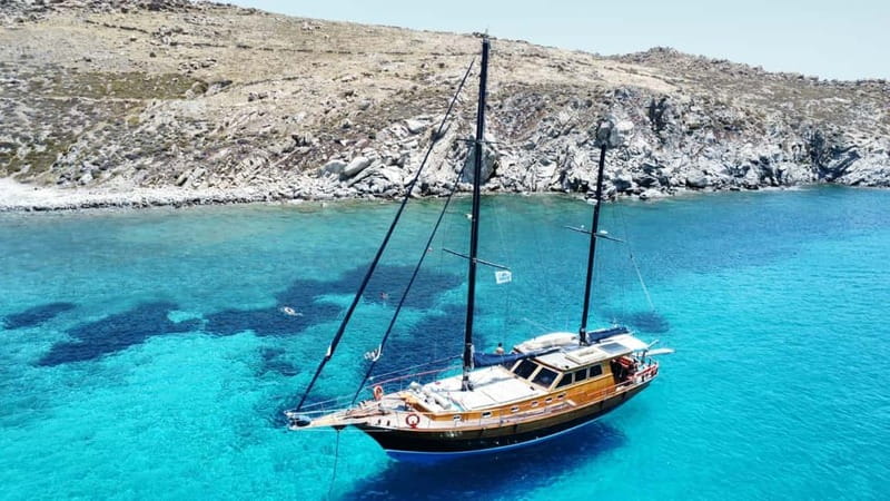 Mykonos: Sunset Boat Cruise with Light Dinner & Drinks - Elia and Super Paradise: Swimming, Snorkeling, and When to Watch the Water