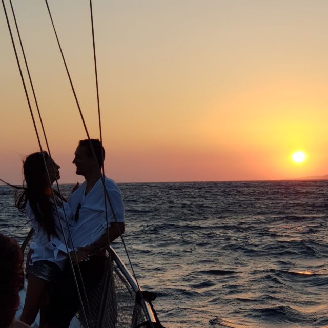 Mykonos: Sunset Boat Trip with Snacks and Drinks - Traditional Boat Experience: What It Feels Like On Deck
