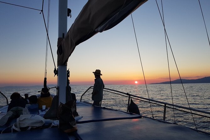 Mykonos Sunset Cruise with Drinks - The Boat and Crew: Friendly Hosts, Older Craft, and Motion Reality