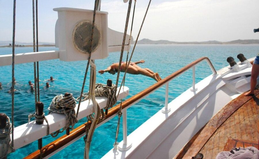 Mykonos: Sunset Party Boat Cruise with 1 Drink - The First Hour: North Coast Views, Music On, and That Boat-Party Feeling
