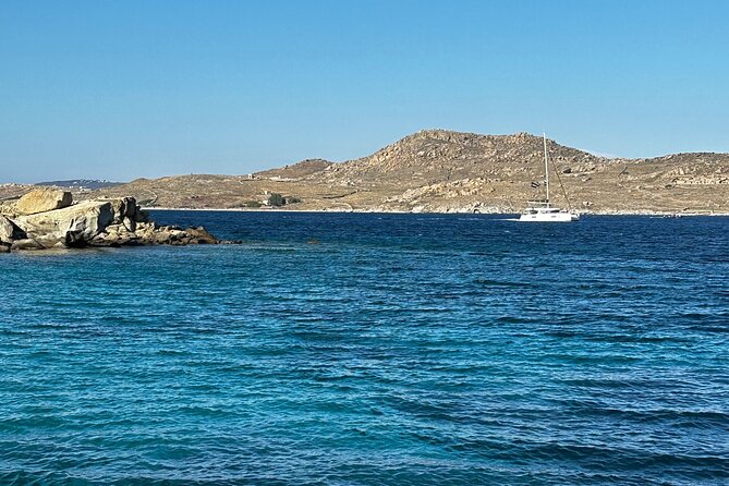Private Cruise with Handmade Antique Boat around Mykonos-Full Day - Super Paradise and Paradise: swim time and party legend energy