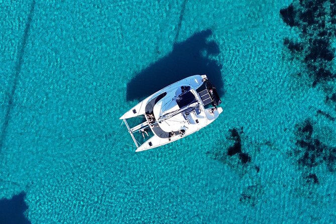 Private Mykonos Catamaran Day Cruise with Meals & Water Toys - A 5-hour private catamaran day: what you’re really buying