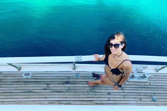 Shared Mykonos Sail Cruise to Delos and Rhenia Islands - The Rhenia Island Stop: Swimming, Snorkeling, and BBQ Lunch
