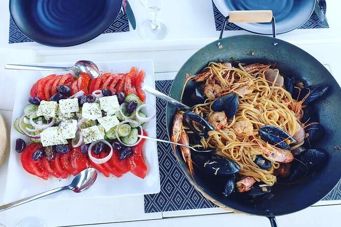 Sunset Tour with Nadia K to Delos and Rhenia Island from Mykonos - The On-Board Dinner: Seafood, Mediterranean Plate, and Drinks Included