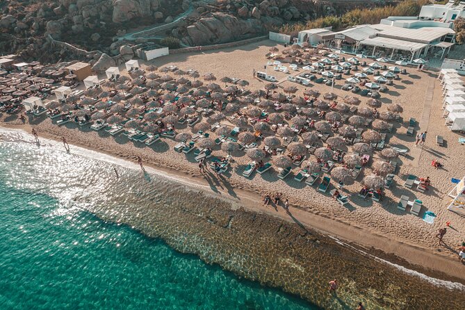 Super Paradise Beach Mykonos Seaside Sunbed (1st row) - Your Beach Day Rhythm: First Swim, Midday Relaxing, Late Music Energy